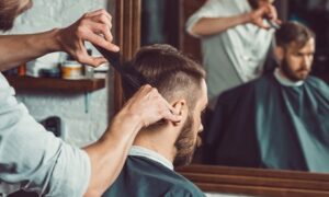 Male visitors can enjoy a style change with a haircut combined with a shave; options to add beard colour or keratin treatment are available for AED20.00 at Discount Sales.