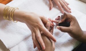 Nail technicians extend the length of clients’ nails
